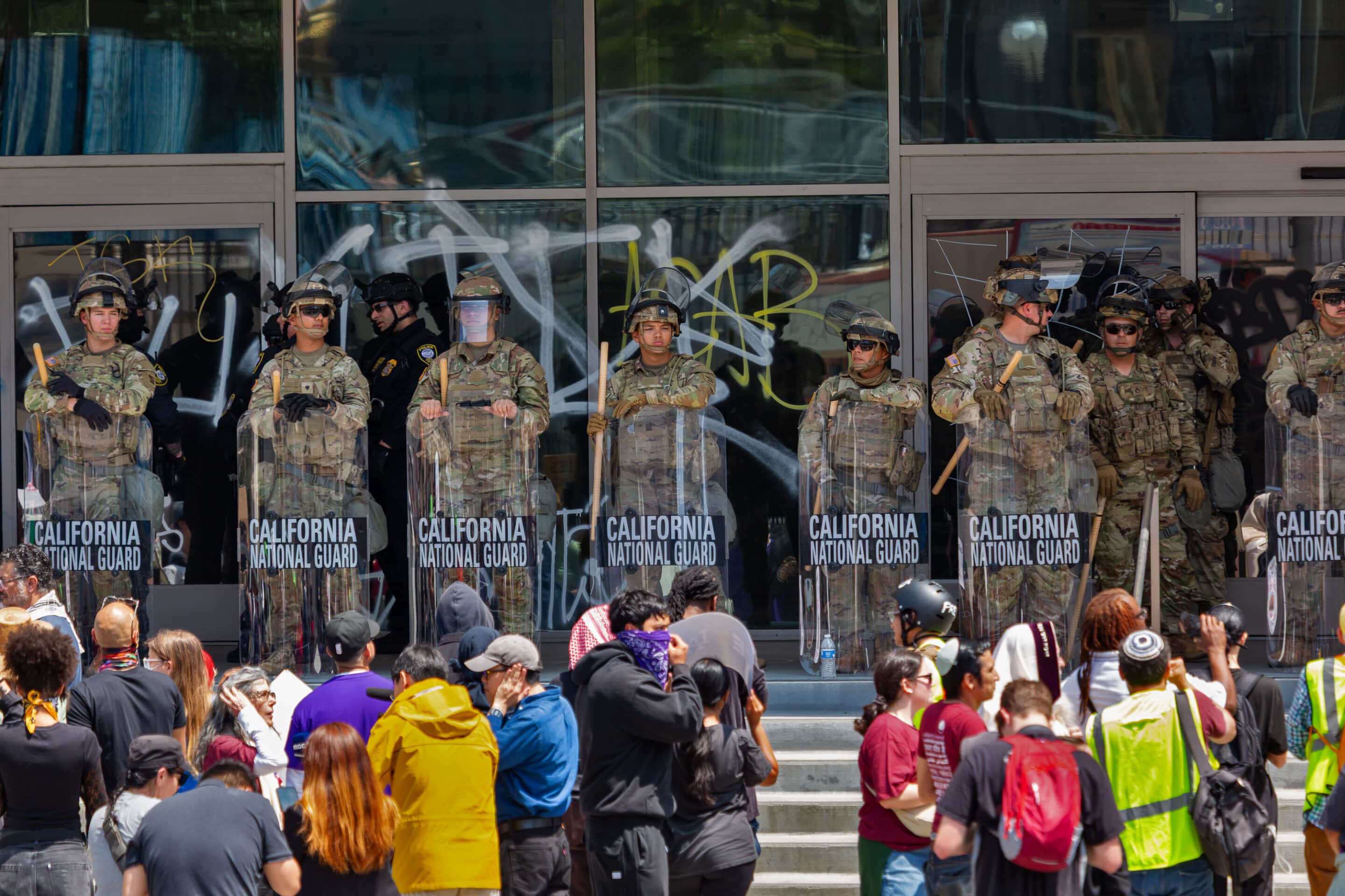 ca guard and protestors, june 2025